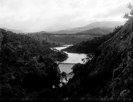 Cotter Dam and dam wall from hills looking west.