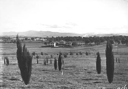 Hotel Acton and bachelor quarters from City Hill .Roman Cypress, Black Locust trees planted on City Hill			