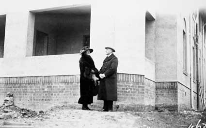 Prime Minister Stanley Melbourne Bruce  and wife watching Parliament House construction