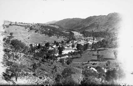 Cotter Pump House on left, Murrumbidgee River Bridge - Construction camp in foreground