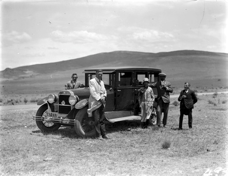 Hudson motor car with five unidentified figures, Canberra