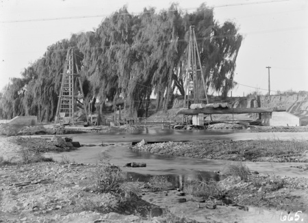 Pile drivers for rebuild of Commonwealth Avenue Bridge.