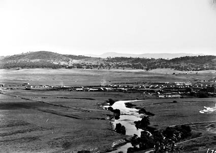 Reid and Braddon area from Civic.Building construction in foreground,Mount Ainslie in background