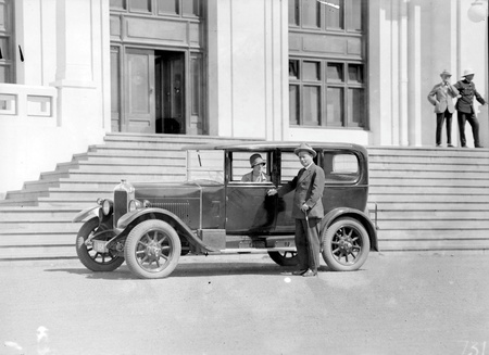 Mr and Mrs Deane in car at in front of Parliament House