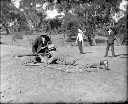 Mt Ainslie Rifle range. Sir John Butters shooting.