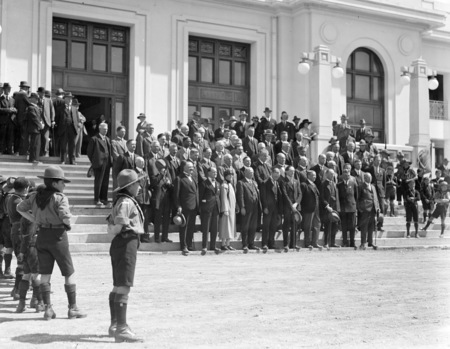 Empire Parliamentary Association delegates on the steps of Parliament House. Canberra Boy Scouts providing Guard of Honour.