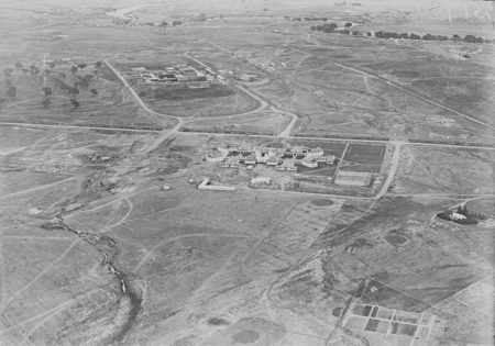 Aerial view showing Parliament House, Hotel Canberra and Molonglo River