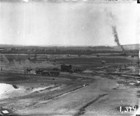 Panorama showing horse drays, steam excavator, sewerage excavation workings and brickworks railway