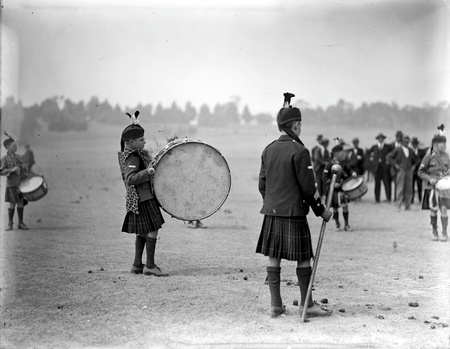 Pipe major and drummers of a bagpipe band at Highland Games, Acton Flats