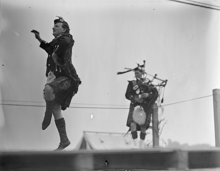 Scottish dancer with piper at Highland  Games, Acton Flats