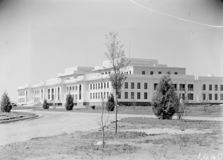 Parliament House completed, from north west showing young trees