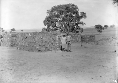 Rt Hon Stanley Melbourne Bruce and Mrs Bruce at Parliament House construction site.