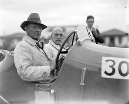 Two contestants in a 100 MPH 3 litre Bentley for the RACV Alpine Rally. Driver Fred Brodribb. A half mile speed test was held in Canberra; the Bentley recorded 74 mph.