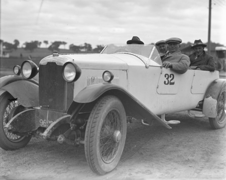 Alpine Rally. Rally car with four passengers.
