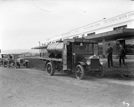 Shell Vulcan petrol tanker with solid rubber wheelsdelivering petrol to Woodgers and Calthorpe garage, Kingston.