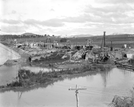 View from northern end of Commonwealth Avenue Bridge over the Molonglo River to Parliament House with sewerage excavations.