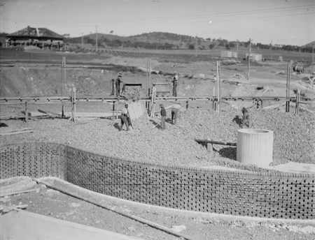 Weston Creek Sewerage Treatment Works. Trickling filters being filled with screenings.