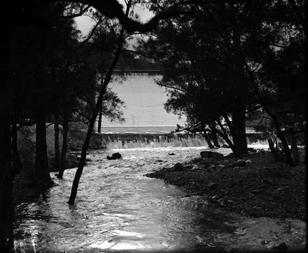 Cotter Dam spillway, stilling pond and Cotter River.