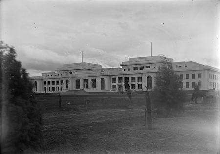 Parliament House frontage with advanced trees.