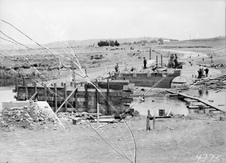 Unidentified bridge under construction, possibly Scott's crossing,Negative cracked