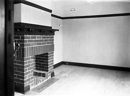 Cottage interiors,living room with brick fireplace