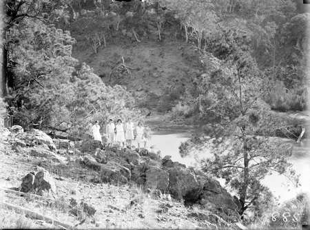 Murrumbidgee River downstream from Kambah pool with a group of walkers.