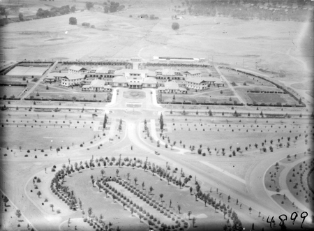 Aeriel view over Parliament House looking west to Hotel Canberra and Molonglo River.