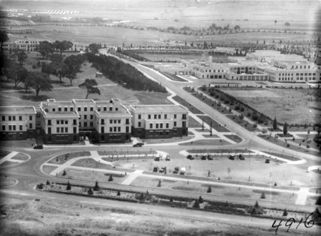 Aerial view over Parliament House and West Block from the west.