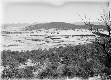 Braddon and Civic Centre from Mt Ainslie. Ainslie Hotel, Limestone Avenue in foreground. Black Mountain in background.