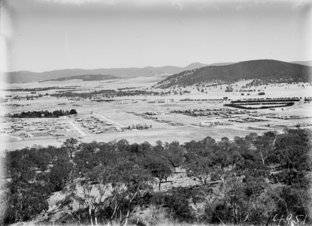 Braddon, Reid and Civic Centre from Mt Ainslie. Ainslie Hotel, Limestone Avenue in foreground. Black Mountain in background.