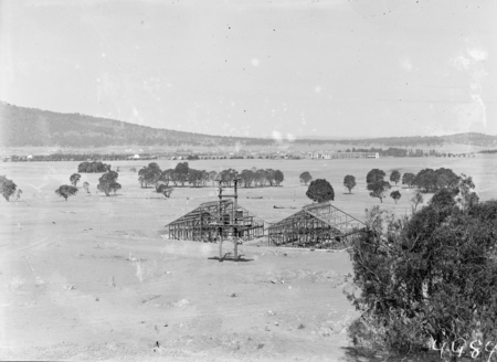 CSIR site, Clunies Ross Street, Black Mountain with electrical transformer and  Insectarium buildings under construction looking east towards Civic Centre.