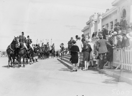 Opening of the 16th Parliament. Govenor-General taking the salute  on the steps of Parliament House showing harnessing of landau and positions of the Light Horse escort.