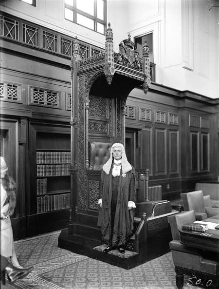 Opening of the 16th Parliament. Sir Littleton Groom at the Speakers Chair in the House of Representatives in his robes of office.