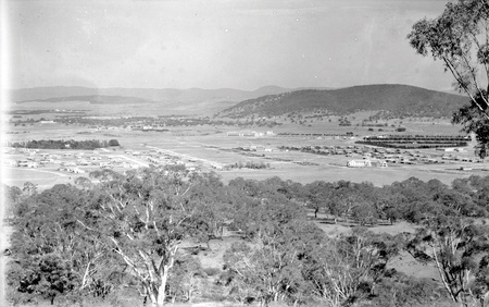 Reid, Braddon and Civic Centre from Mt Ainslie. Ainslie Hotel, Limestone Avenue on right, Black Mountain at the rear