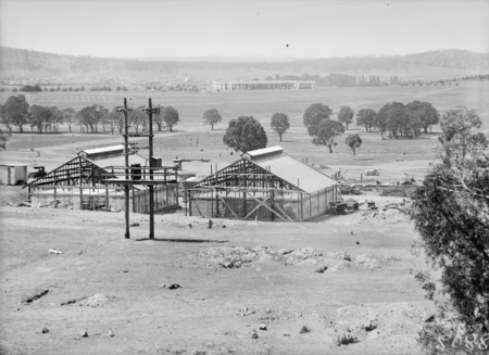 Construction site for CSIR Insectarium, Clunies Ross Street, Black Mountain, Civic buildings in the background.
