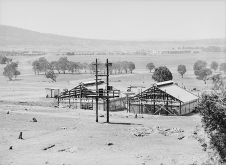 Construction site for CSIR Insectarium, Clunies Ross Street, Black Mountain. Civic buildings at the rear.