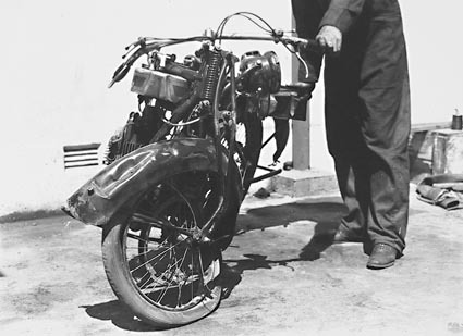 Accident between a Douglas motor cycle and a motor car, Lenane Road,  Queanbeya -  Wrecked motorcycle