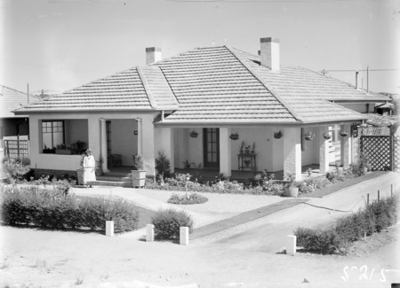 House with well developed garden.