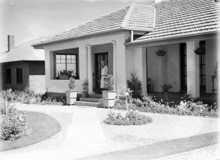 House with well developed garden.