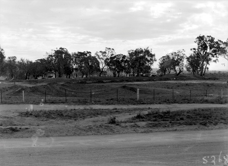 Unknown landscape with earth moving machinery