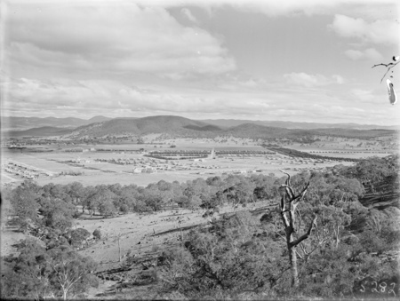 Braddon and Civic Centre from Mt Ainslie. Ainslie Hotel in the centre. Black Mountain at the rear