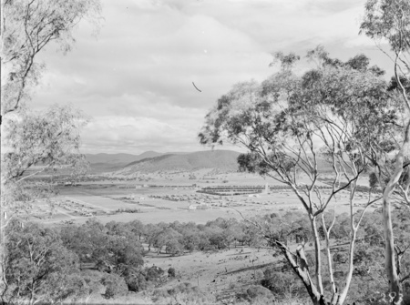 Braddon and Civic Centre from Mt Ainslie. Ainslie Hotel in the centre. Black Mountain at the rear