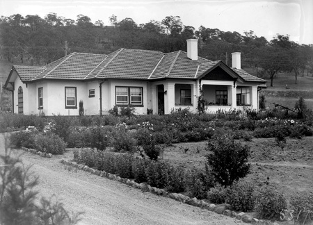 Home and garden of Mr. Harry Sheehan at 12 Mugga Way, Red Hill.