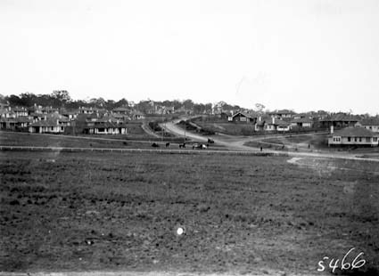 Houses at corner of Sorrel Street, Hobart Avenue, Arthur Circle and Dominion Circuit, Forrest. Horse paddock inside Arthur Circle