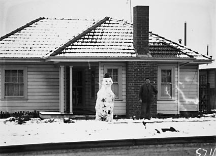 Record fall of snow - House with snowman in Ainslie