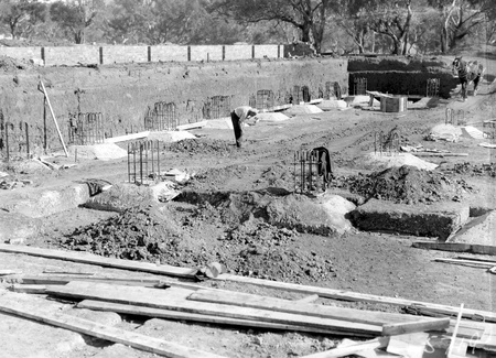 Australian Institute of Anatomy foundations being  concreted. Concrete mixer and wheelbarrows at work,  McCoy Circle Acton