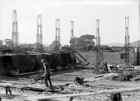 Australian Institute of Anatomy foundations being concreted, wheelbarrows at work, McCoy Circle Acton