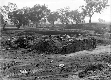 Australian Institute of Anatomy foundations being prepared. and bricks being laid,  McCoy Circle Acton