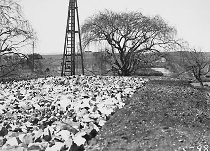 Road to Queanbeyan at Jerabombera Creek crossing under construction.Willows and pile driver