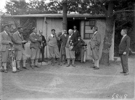 Right Honourable Stanley Melbourne Bruce with a group of golfers at the Royal Canberra Golf Club.